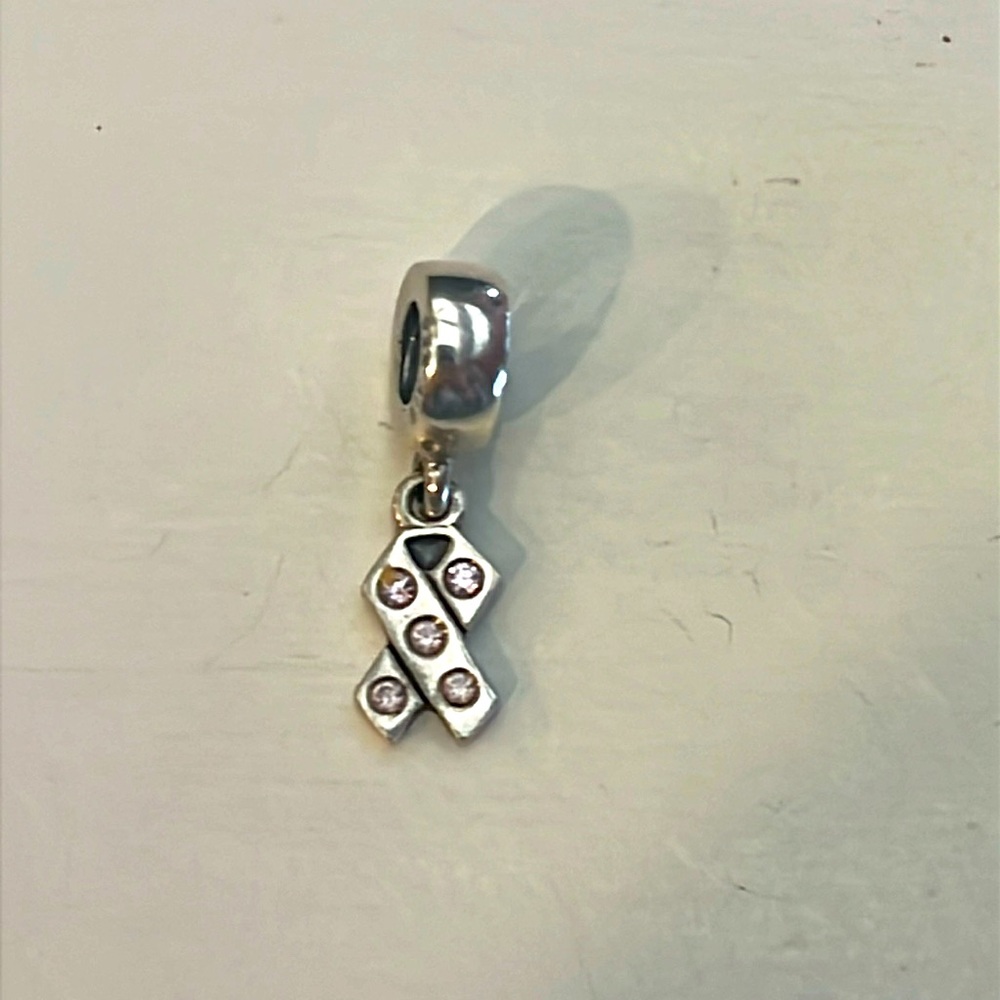 Retired Pandora Breast Cancer Awareness Ribbon Dangle Charm
ALE 925